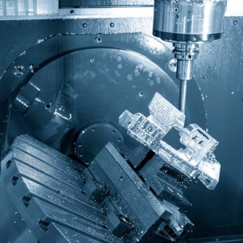 The 5-axis machining center cutting aerospace parts with solid ball end mill tool. The hi-precision automotive manufacturing process by multi-axis CNC milling machine.